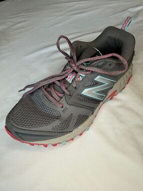 New Balance Gray Trail Runners with Pink and Light Blue Accents
